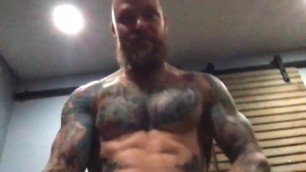 tatted bearded muscle daddy pumps out a load